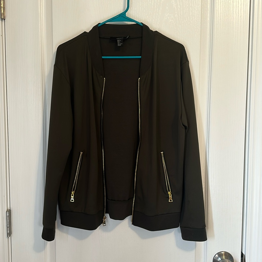 Army Green bomber jacket with gold zippers.